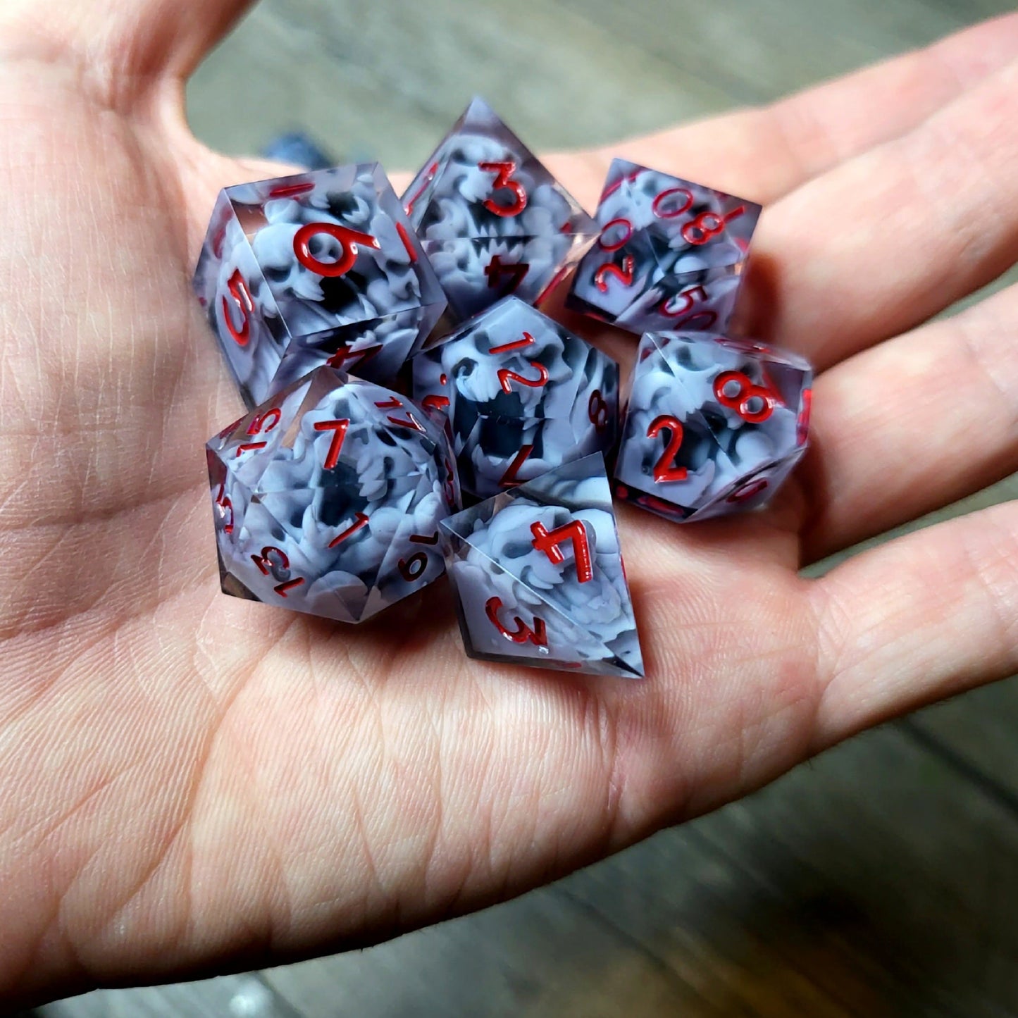 Dice set with 7 pieces with skull inside in spirit theme for role-playing games for Dungeons and Dragons