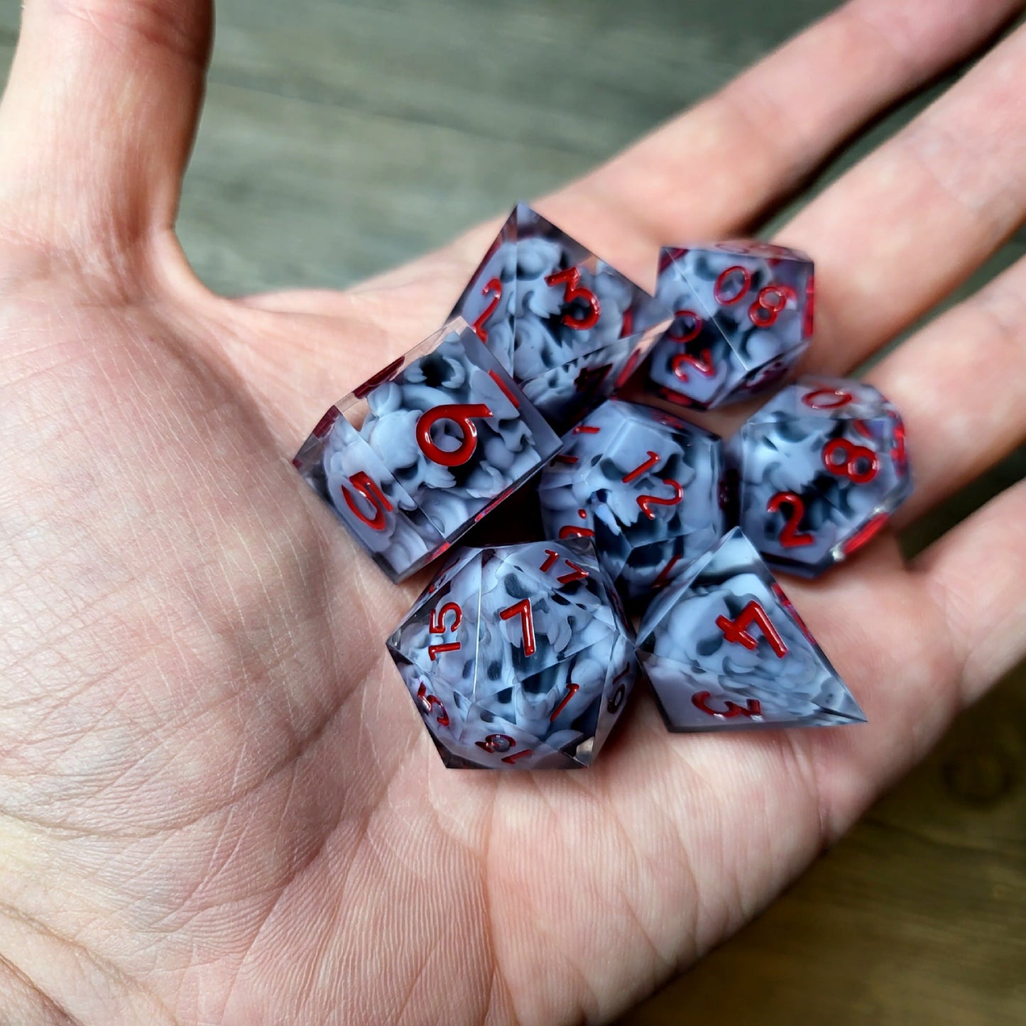 Dice set with 7 pieces with skull inside in spirit theme for role-playing games for Dungeons and Dragons
