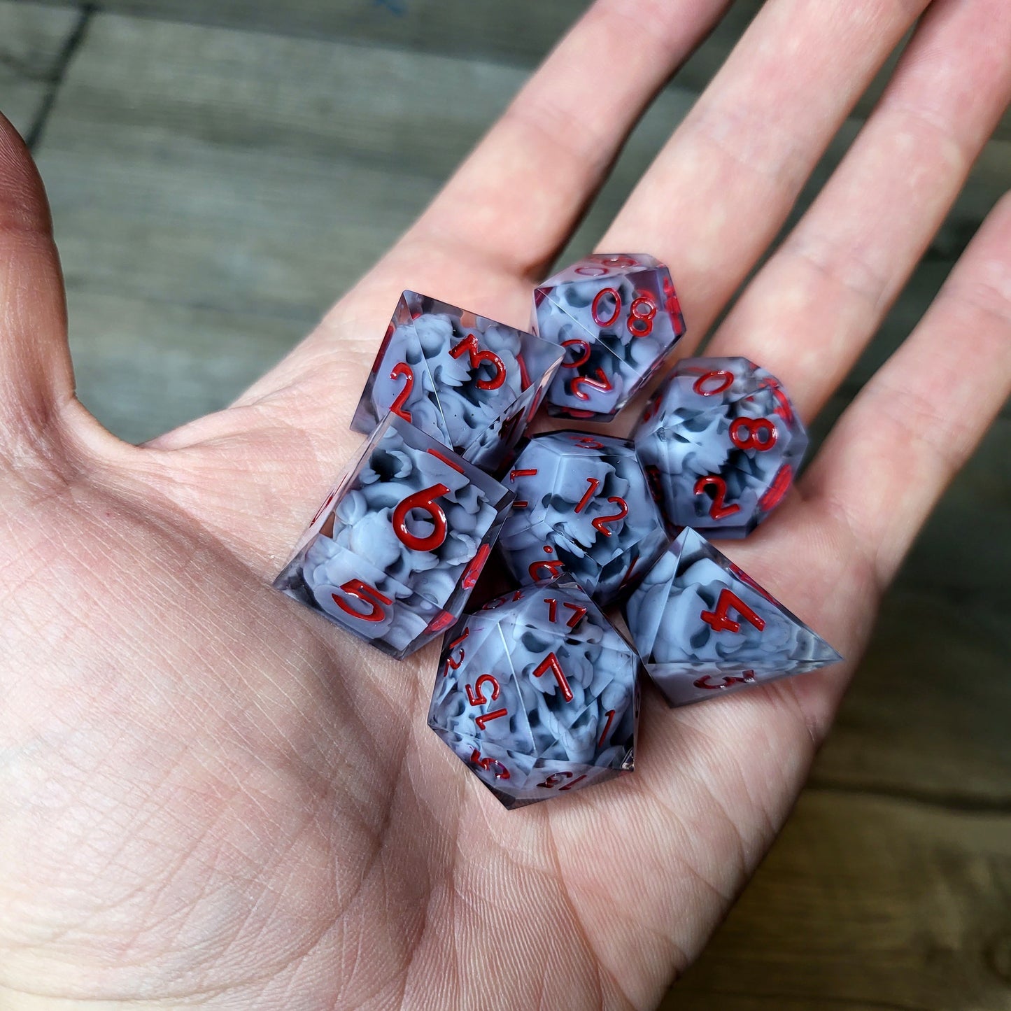 Dice set with 7 pieces with skull inside in spirit theme for role-playing games for Dungeons and Dragons