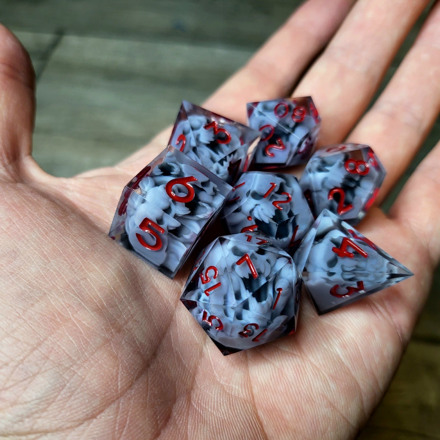 Dice set with 7 pieces with skull inside in spirit theme for role-playing games for Dungeons and Dragons