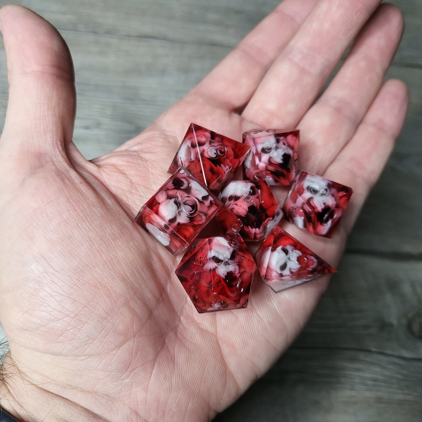 Dice set with 7 pieces with skull inside in spirit theme for role-playing games for Dungeons and Dragons
