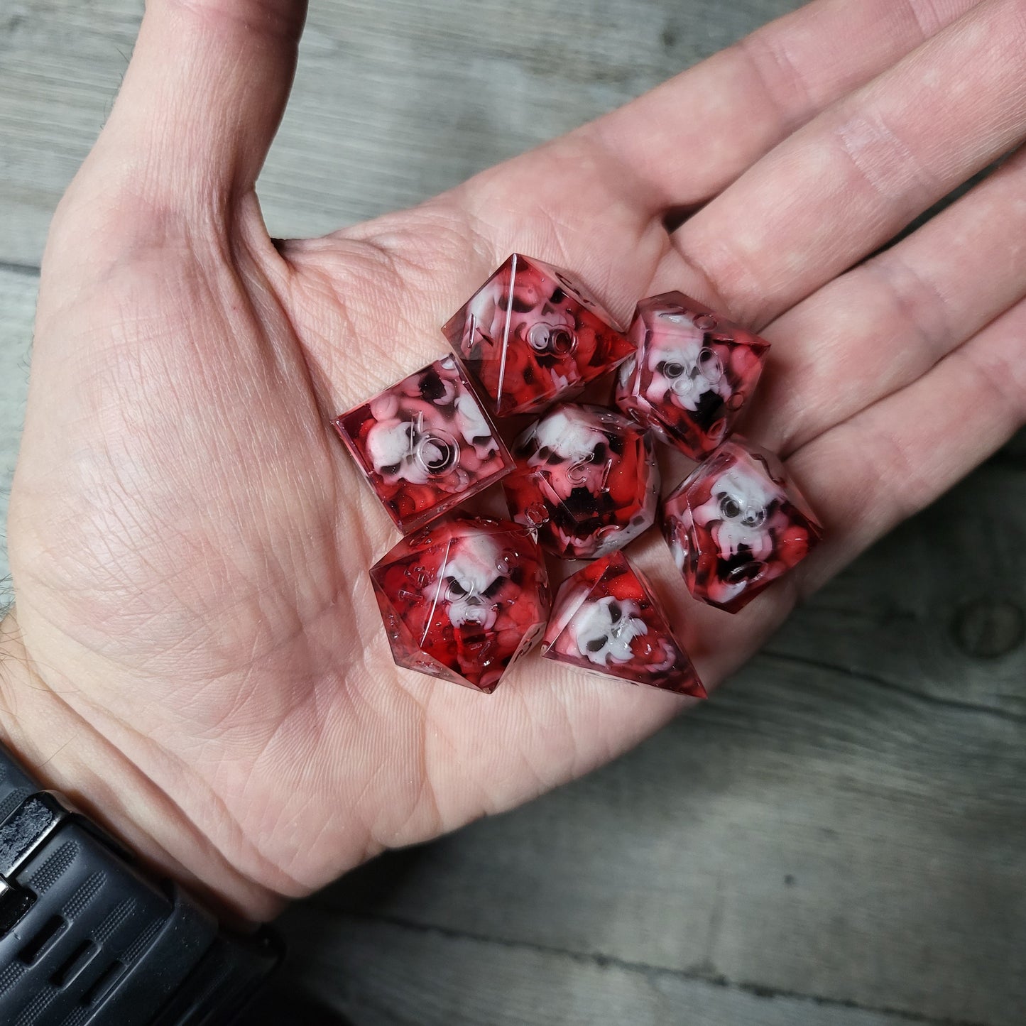 Dice set with 7 pieces with skull inside in spirit theme for role-playing games for Dungeons and Dragons