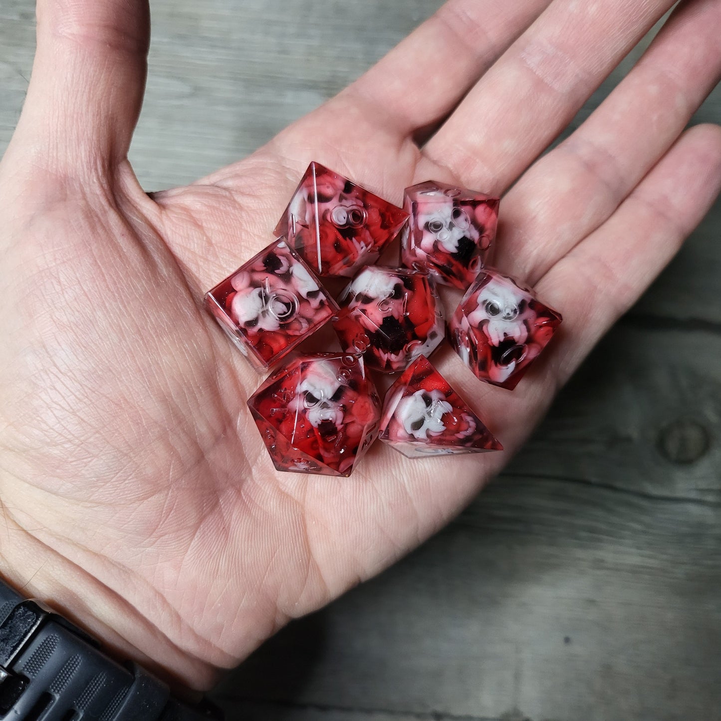 Dice set with 7 pieces with skull inside in spirit theme for role-playing games for Dungeons and Dragons