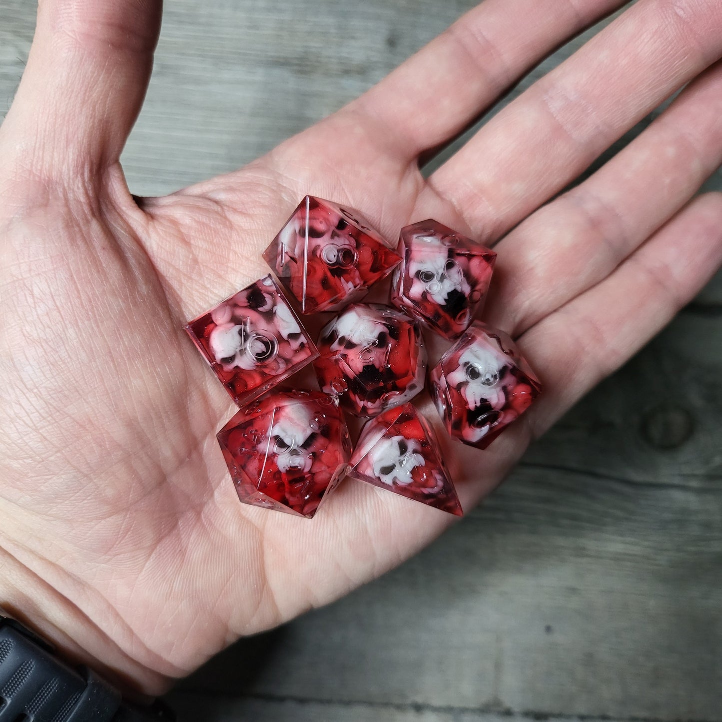 Dice set with 7 pieces with skull inside in spirit theme for role-playing games for Dungeons and Dragons