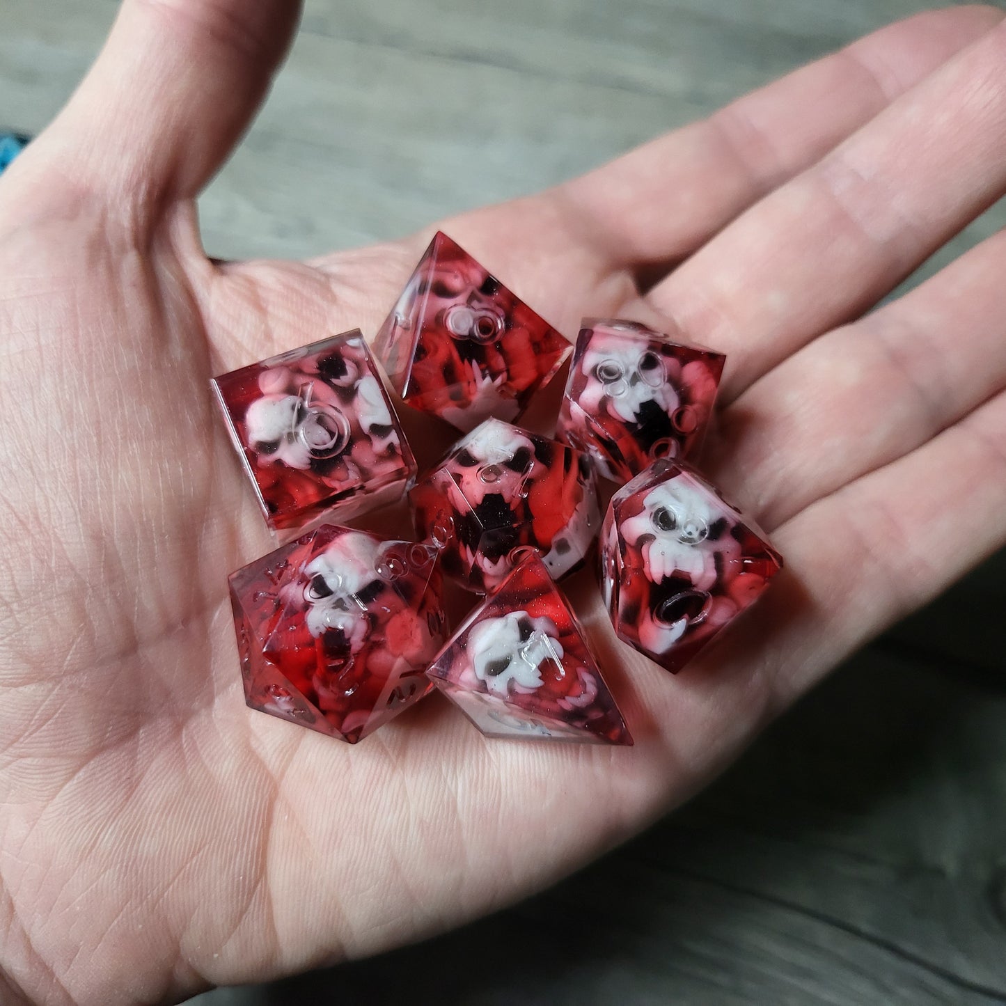 Dice set with 7 pieces with skull inside in spirit theme for role-playing games for Dungeons and Dragons