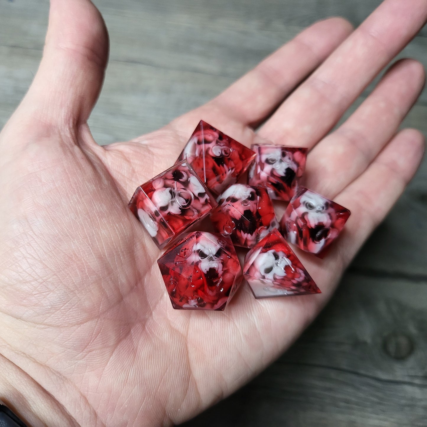 Dice set with 7 pieces with skull inside in spirit theme for role-playing games for Dungeons and Dragons