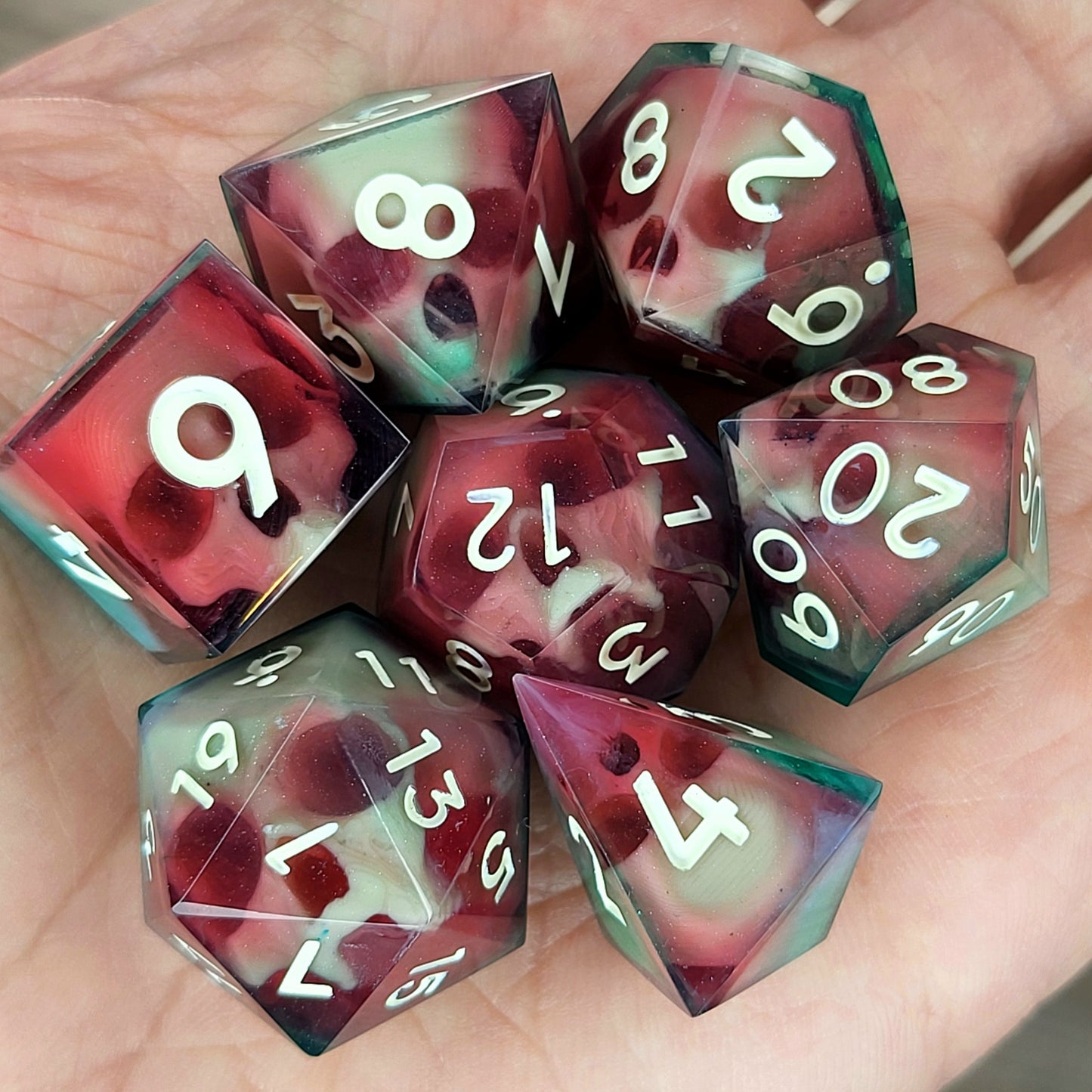Dnd Dice set for role playing for Dungeons and Dragons with skull inside and red and green resin