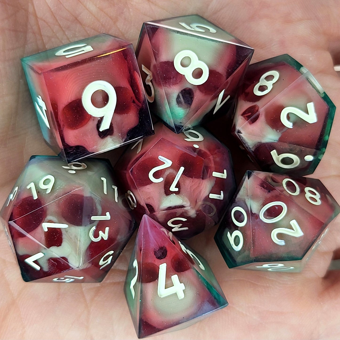 Dnd Dice set for role playing for Dungeons and Dragons with skull inside and red and green resin