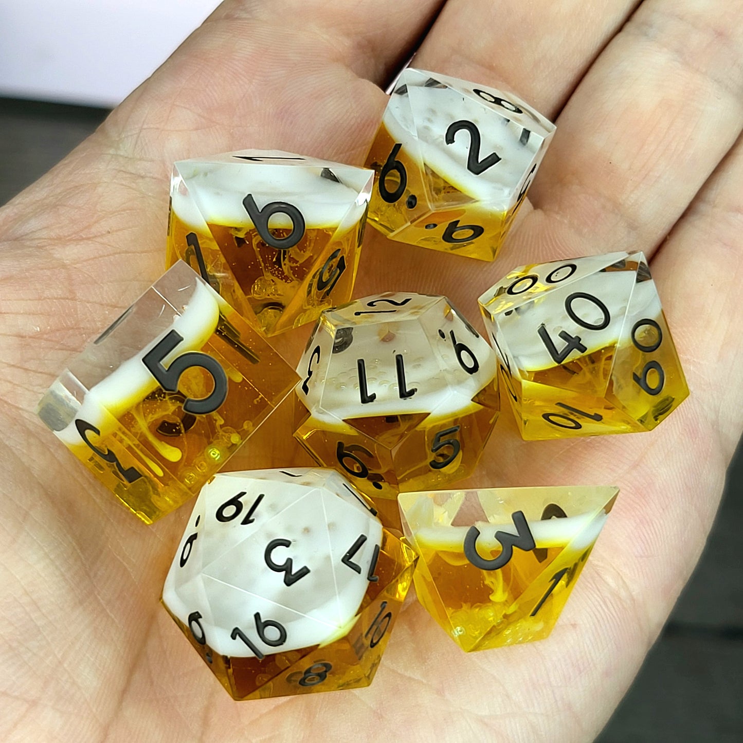 Handmade sharp edge resin dice set inspired by beer white foam effect and black numbers for Dungeons and Dragons tabletop RPGs