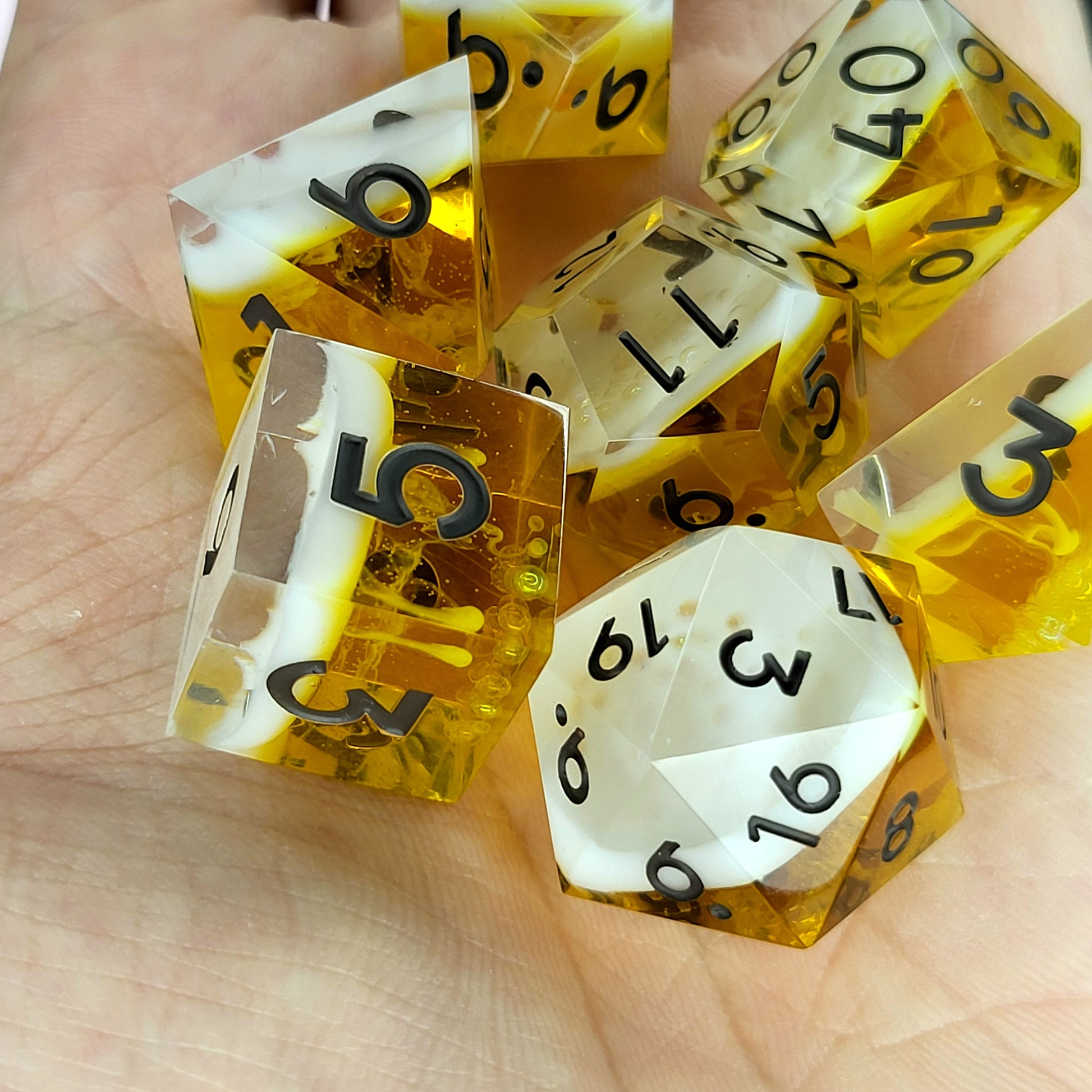 Handmade sharp edge resin dice set inspired by beer white foam effect and black numbers for Dungeons and Dragons tabletop RPGs