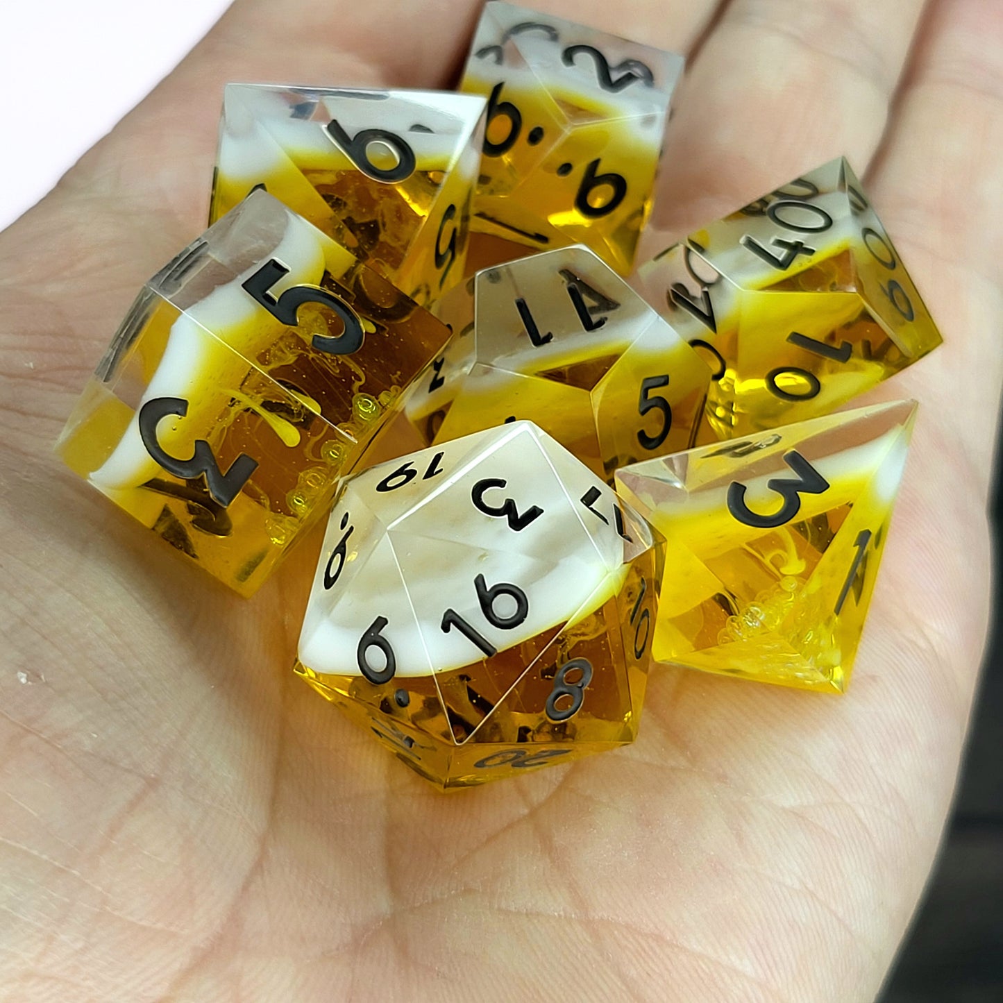 Handmade sharp edge resin dice set inspired by beer white foam effect and black numbers for Dungeons and Dragons tabletop RPGs