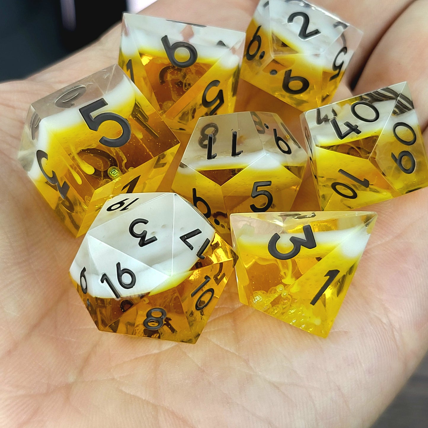 Handmade sharp edge resin dice set inspired by beer white foam effect and black numbers for Dungeons and Dragons tabletop RPGs
