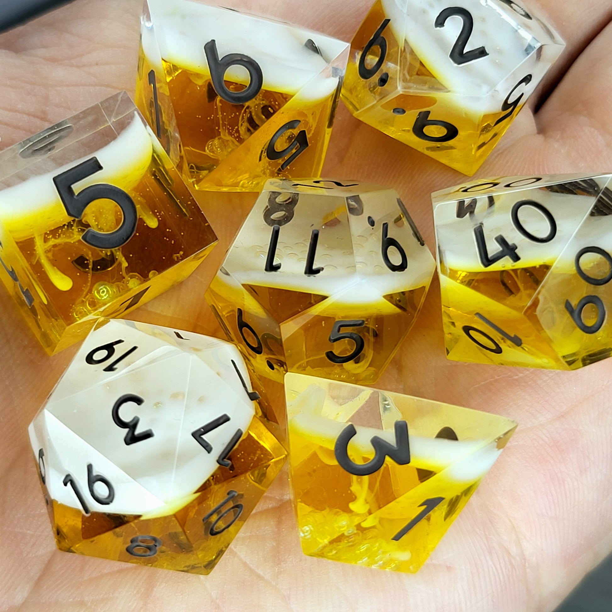 Handmade sharp edge resin dice set inspired by beer white foam effect and black numbers for Dungeons and Dragons tabletop RPGs