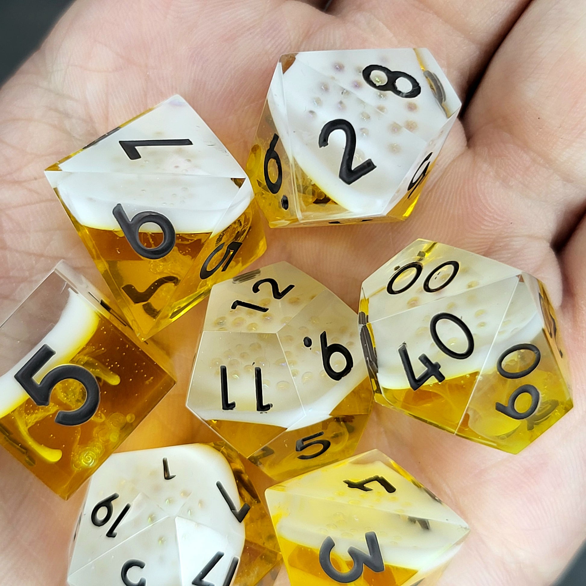 Handmade sharp edge resin dice set inspired by beer white foam effect and black numbers for Dungeons and Dragons tabletop RPGs