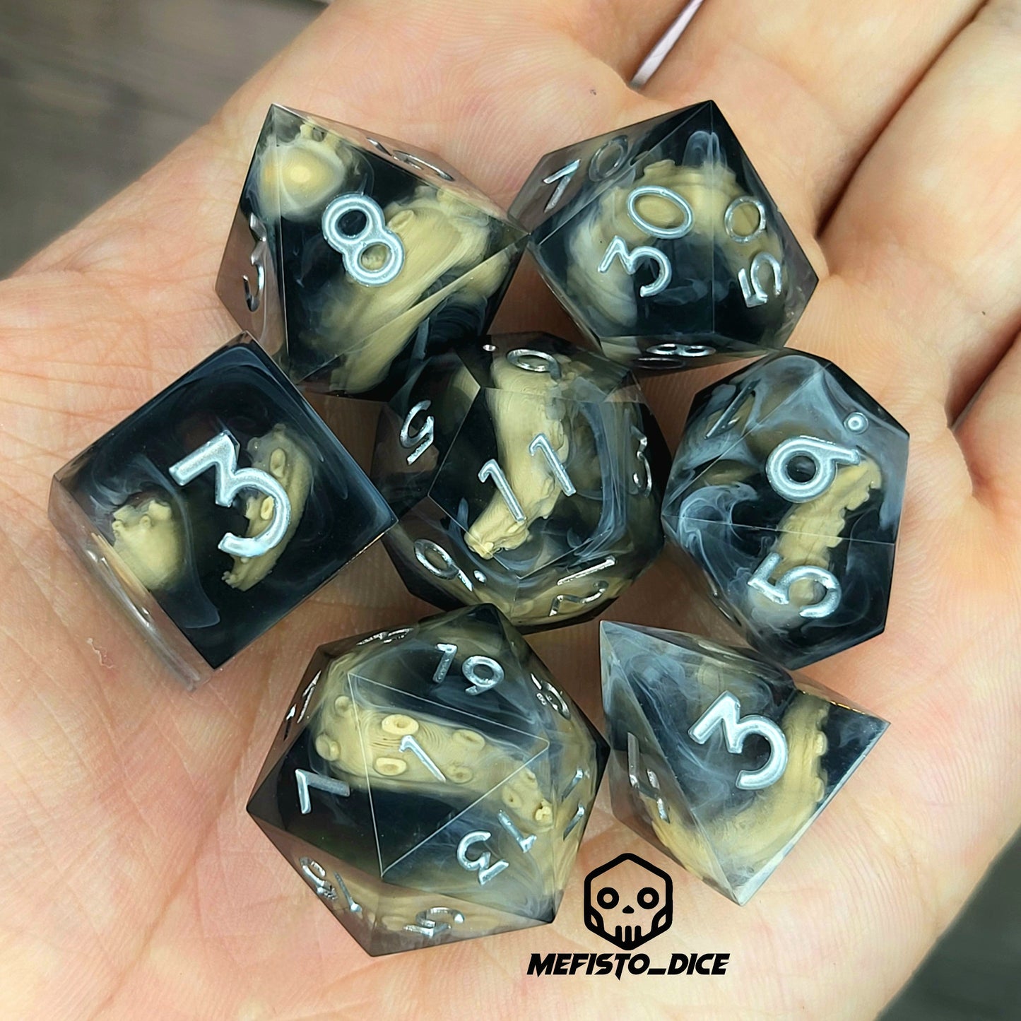 Handcrafted sharp edge resin dice featuring eerie brown tentacles suspended in dark transparent resin, surrounded by ghostly white mist and finished with metallic silver numbers