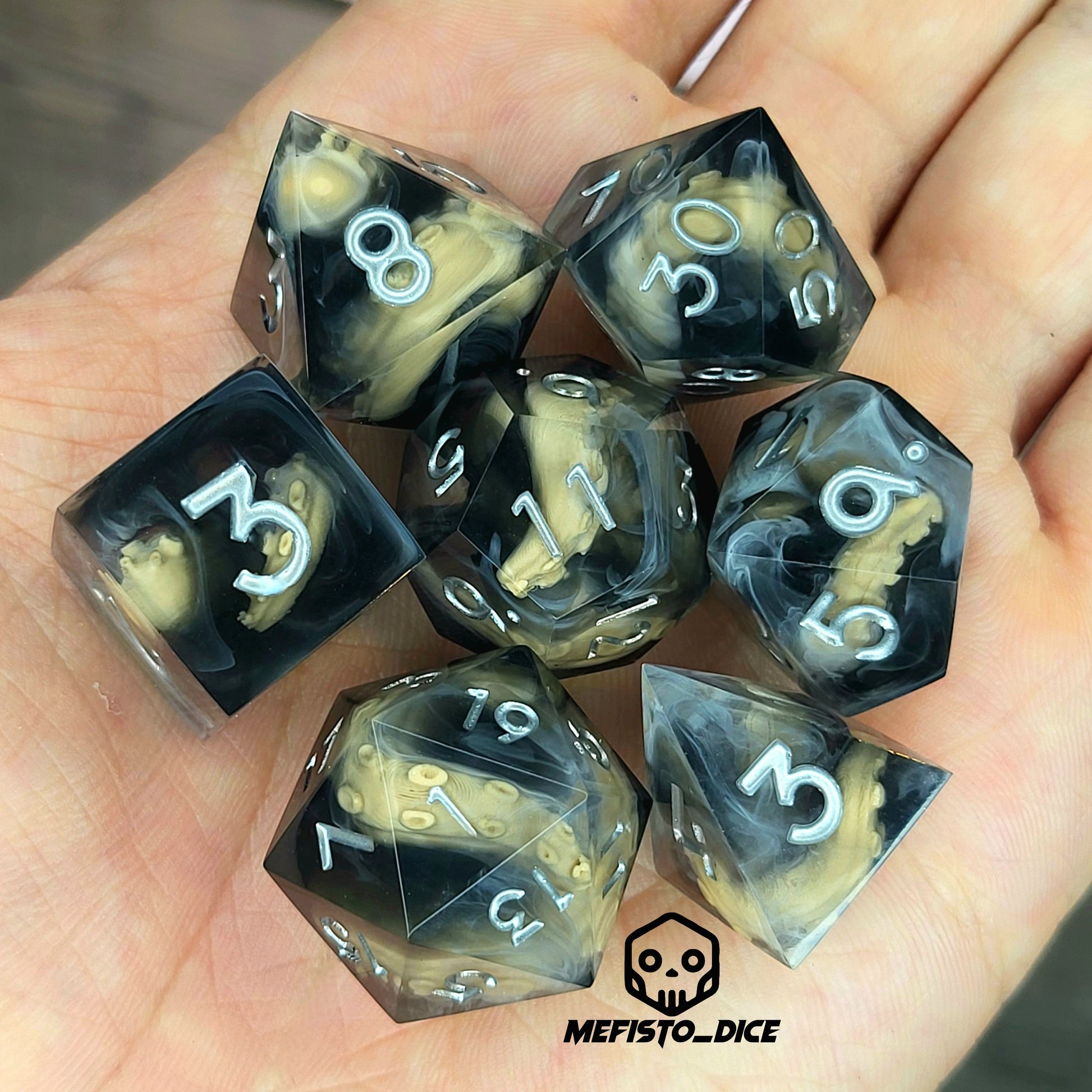Handcrafted sharp edge resin dice featuring eerie brown tentacles suspended in dark transparent resin, surrounded by ghostly white mist and finished with metallic silver numbers