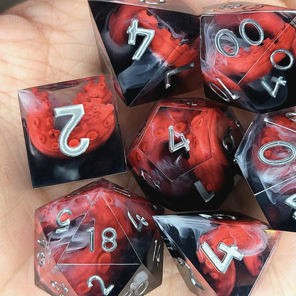 Handcrafted sharp edge resin dice featuring eerie red tentacles suspended in dark transparent resin, surrounded by ghostly white mist and finished with metallic silver numbers