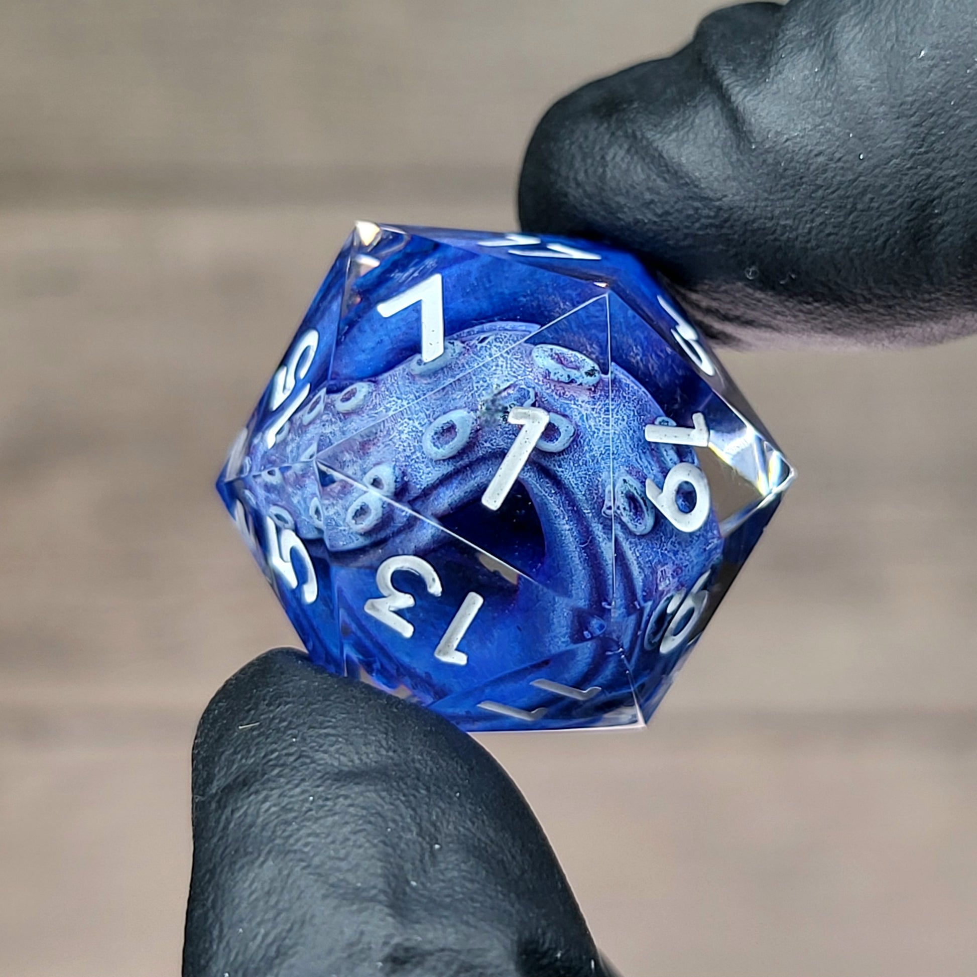 D20 dice with blue tentacles inside and white numbers for play dnd , dungeons and dragons , Call of Cthulhu
