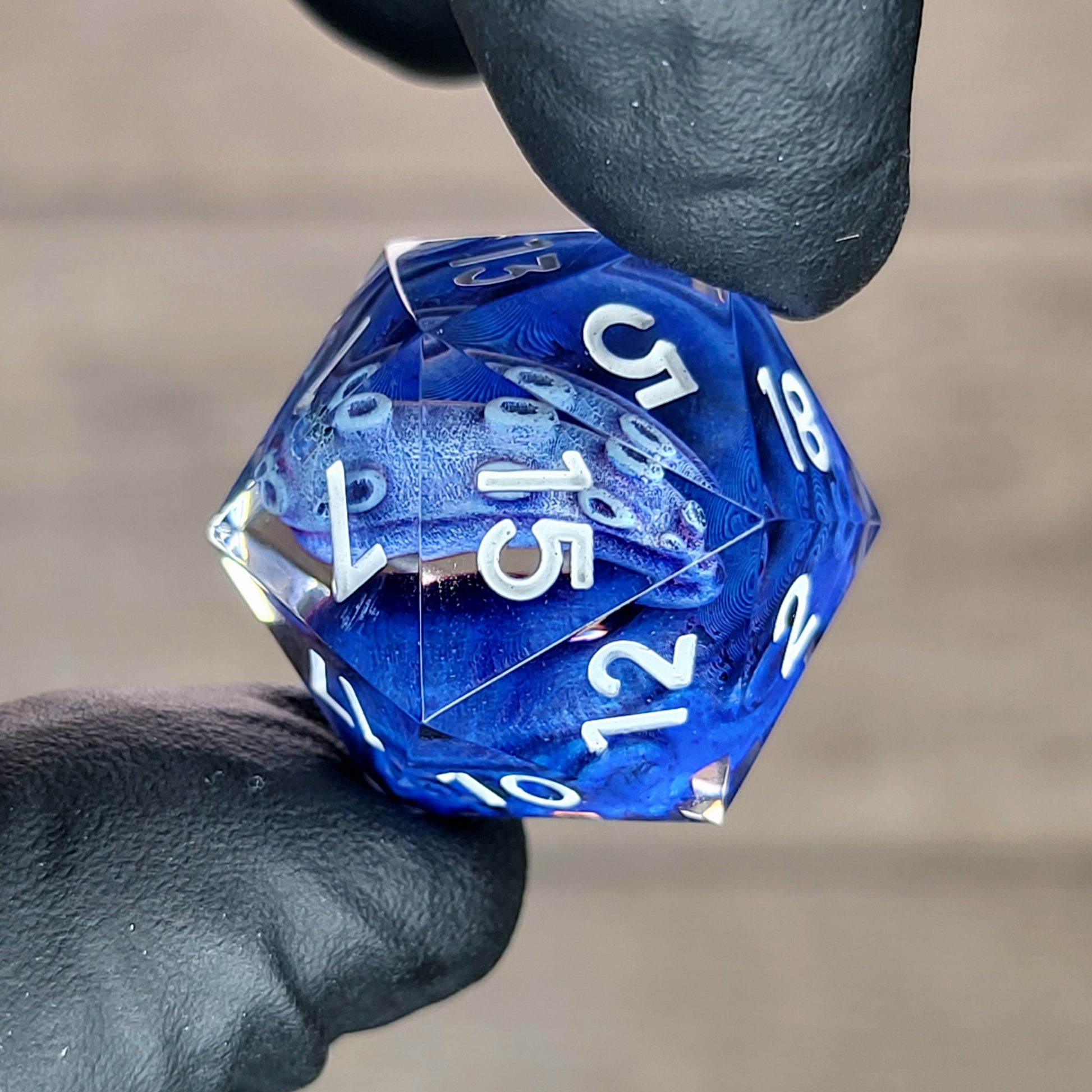 D20 dice with blue tentacles inside and white numbers for play dnd , dungeons and dragons , Call of Cthulhu