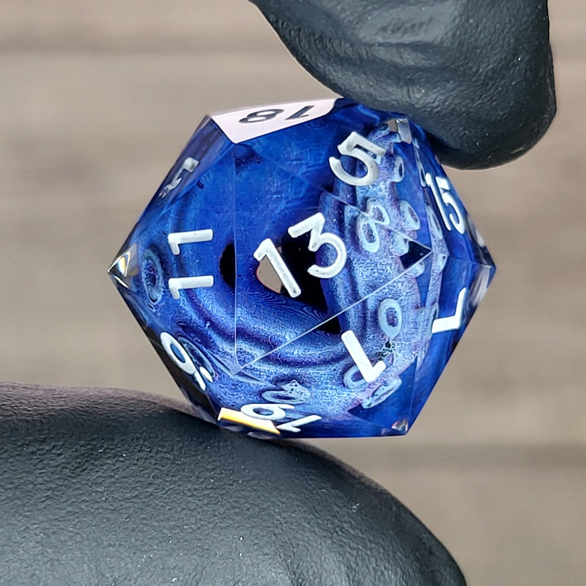 D20 dice with blue tentacles inside and white numbers for play dnd , dungeons and dragons , Call of Cthulhu