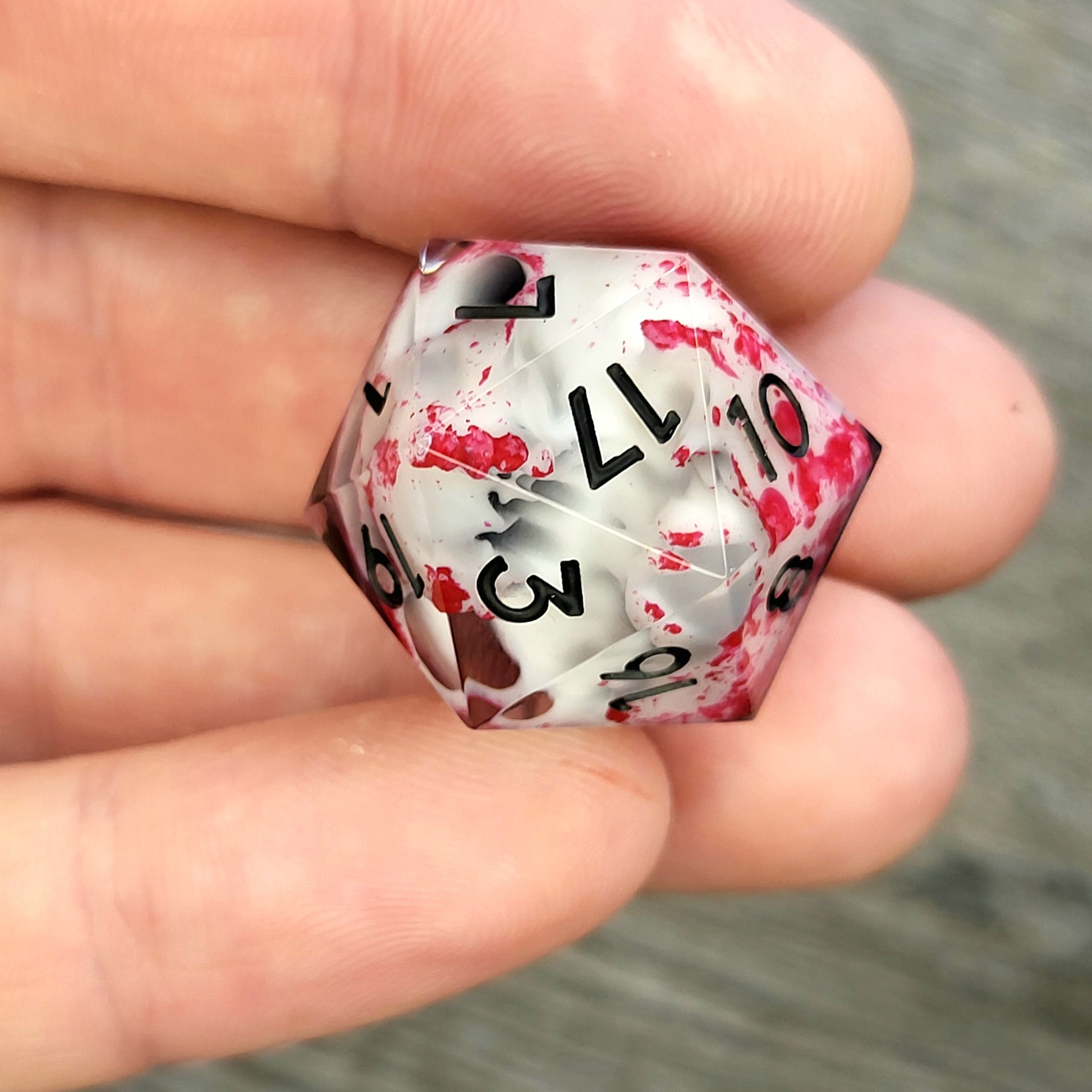 D20 dice with white skull inside , black numbers for play dnd , dungeons and dragons
