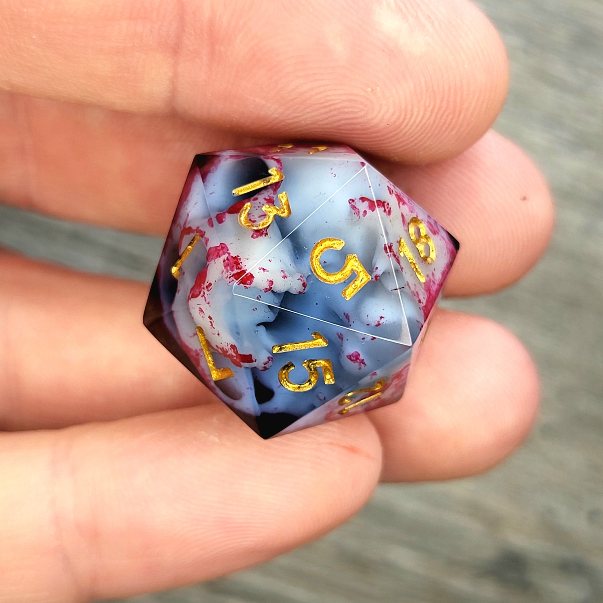 D20 dice with white skull inside , gold numbers for play dnd , dungeons and dragons