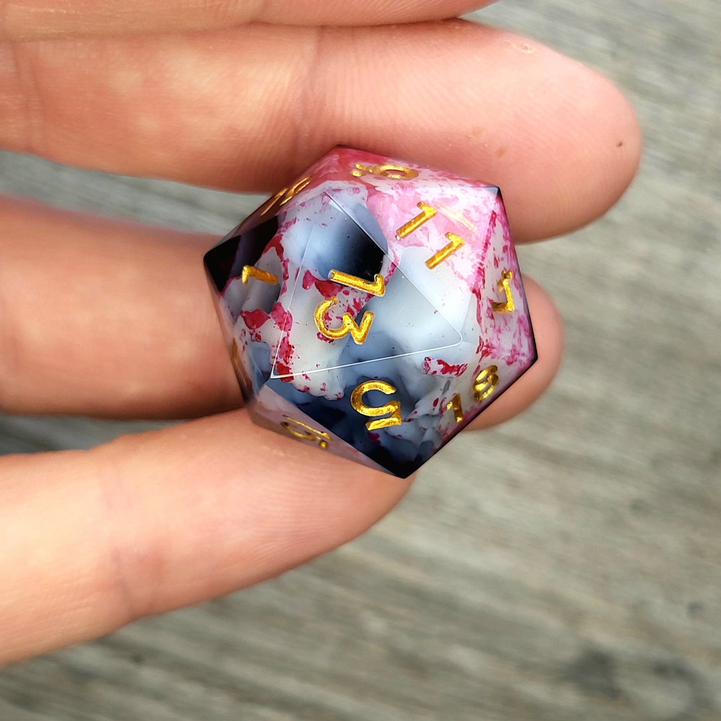 D20 dice with white skull inside , gold numbers for play dnd , dungeons and dragons