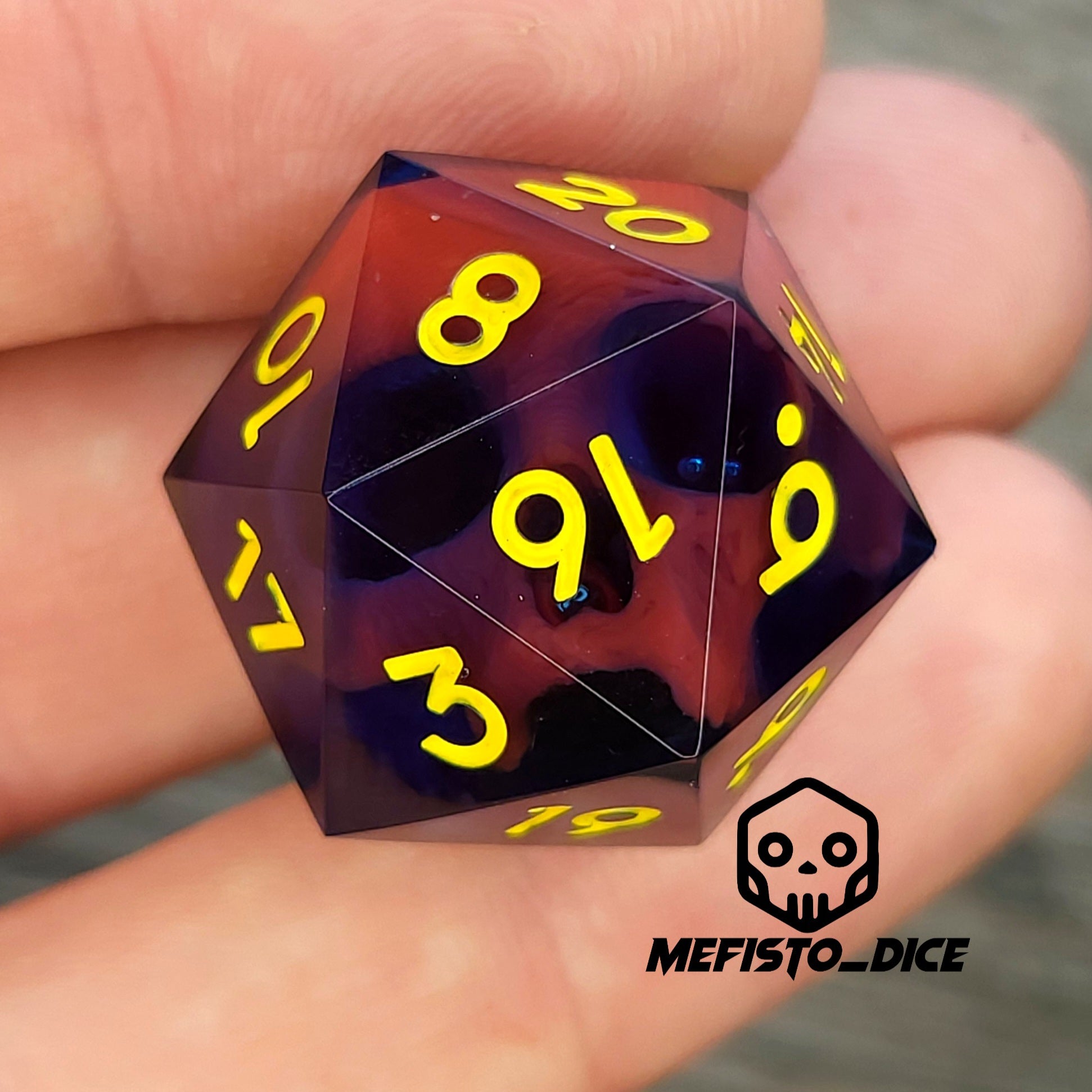 D20 dice with red skull inside , yellow numbers for play dnd , dungeons and dragons