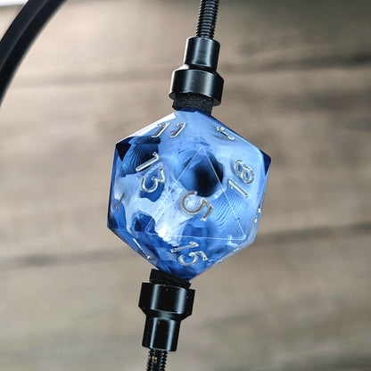 This is a single set of one D20 DnD die with a white skull inside , black resin and silver numbers