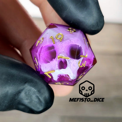 This is a single set of one D20 DnD die with a white skull inside , pink resin and gold numbers