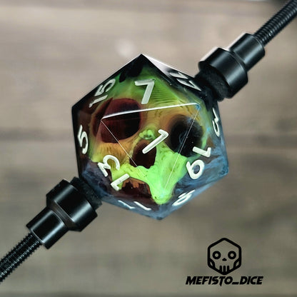 This is a single set of one D20 DnD die with a yellow skull inside , black and white resin and gold and grey number
