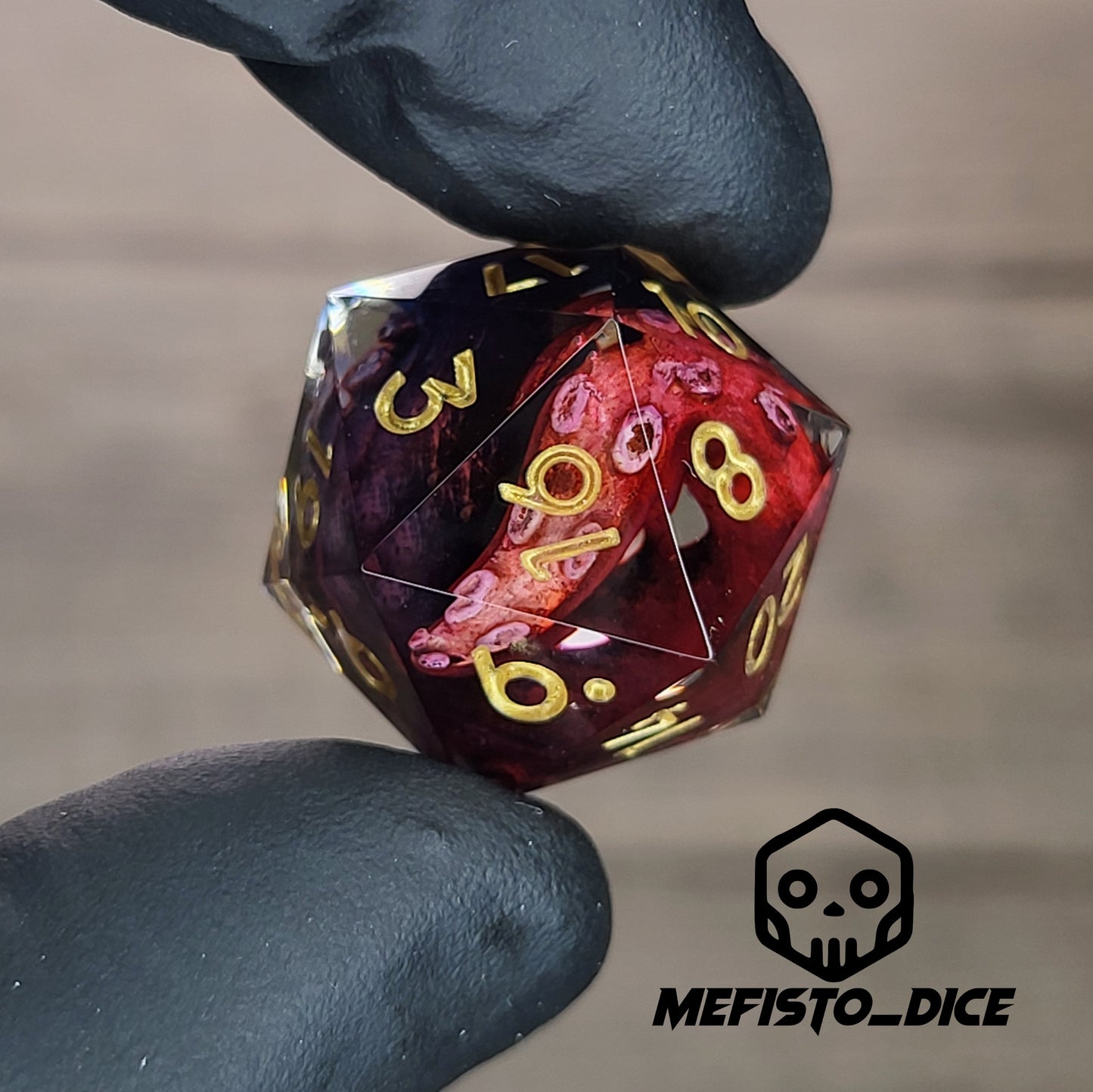 D20 dice with red and blue tentacles inside and gold numbers for play dnd , dungeons and dragons
