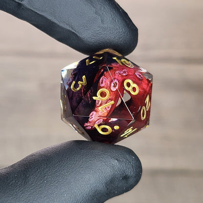 D20 dice with red and blue tentacles inside and gold numbers for play dnd , dungeons and dragons