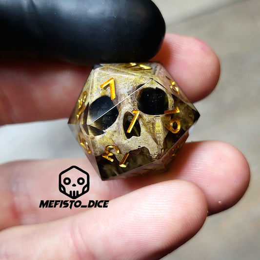This is a single set of one D20 DND die with a light brown skull inside ,black resin and gold numbers