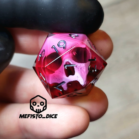 This is a single set of one D20 DND die with a pink skull inside ,red resin and black silver numbers