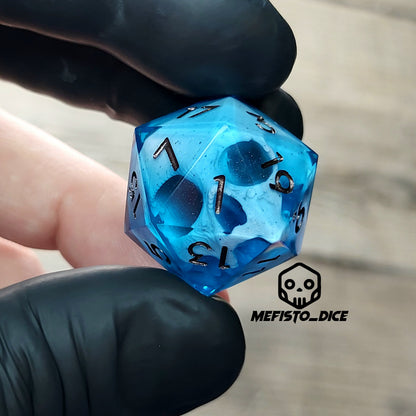 This is a single set of one D20 DnD die with a white skull inside ,blue resin and metal dark numbers