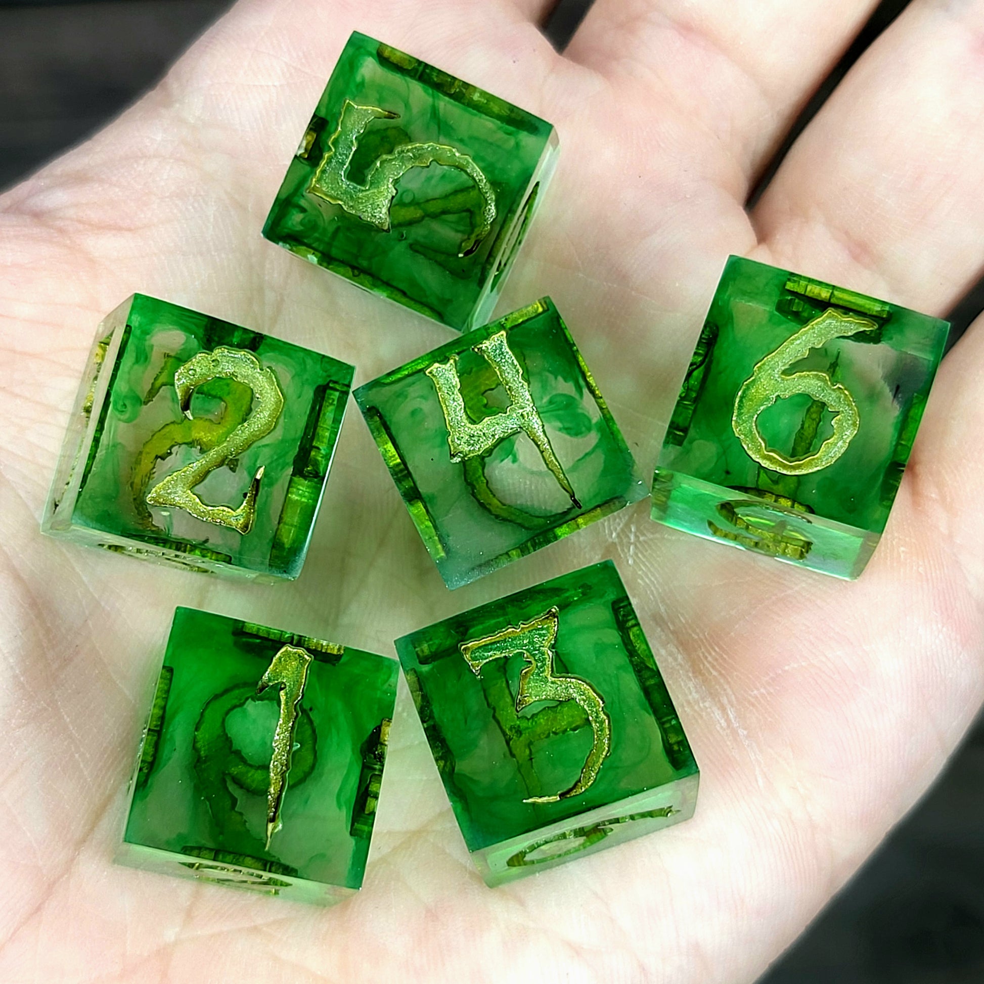 green resin D6 dice set with bronze numbers, handmade design for Dungeons and Dragons and tabletop RPG