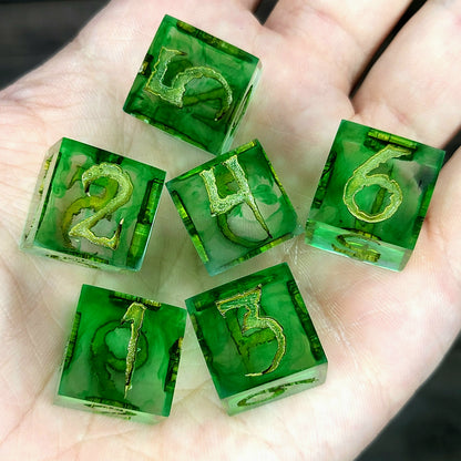 green resin D6 dice set with bronze numbers, handmade design for Dungeons and Dragons and tabletop RPG