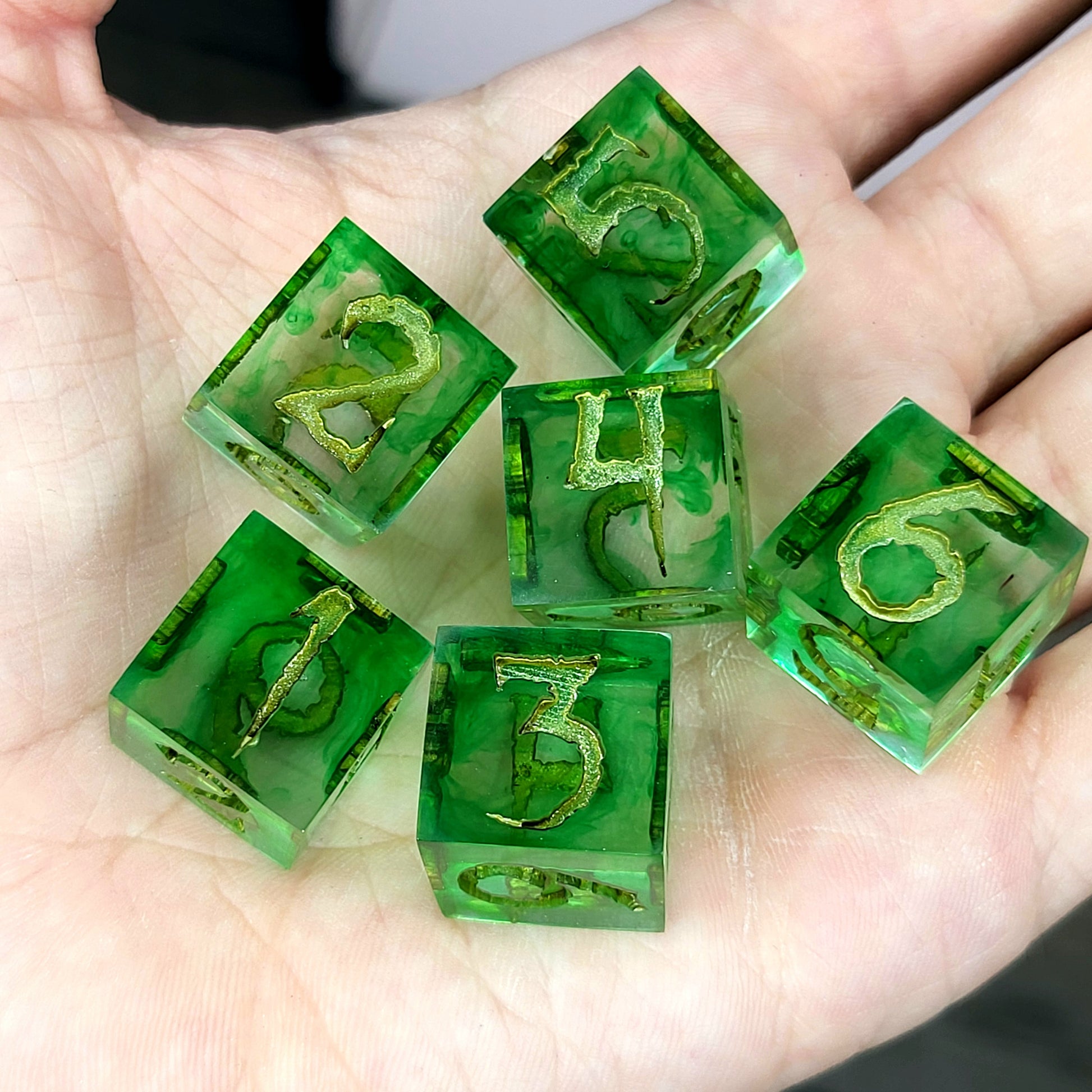 green resin D6 dice set with bronze numbers, handmade design for Dungeons and Dragons and tabletop RPG
