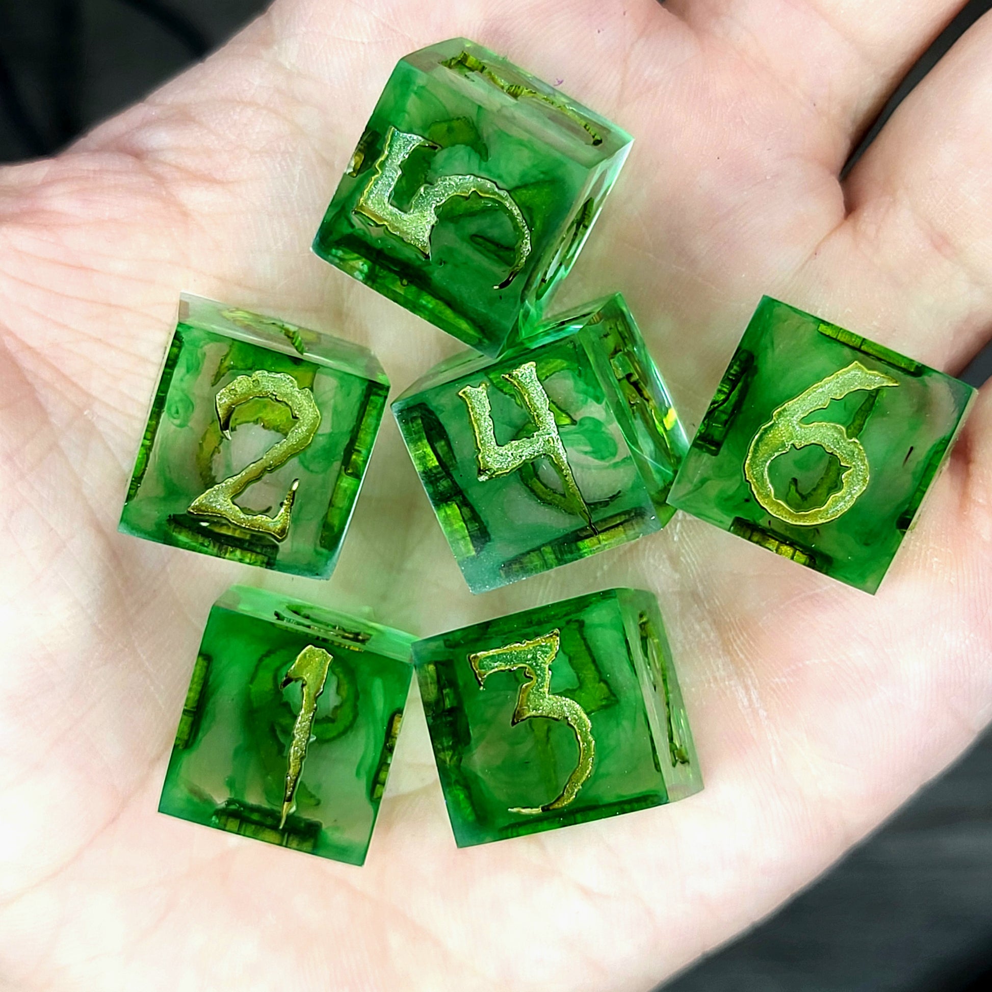 green resin D6 dice set with bronze numbers, handmade design for Dungeons and Dragons and tabletop RPG