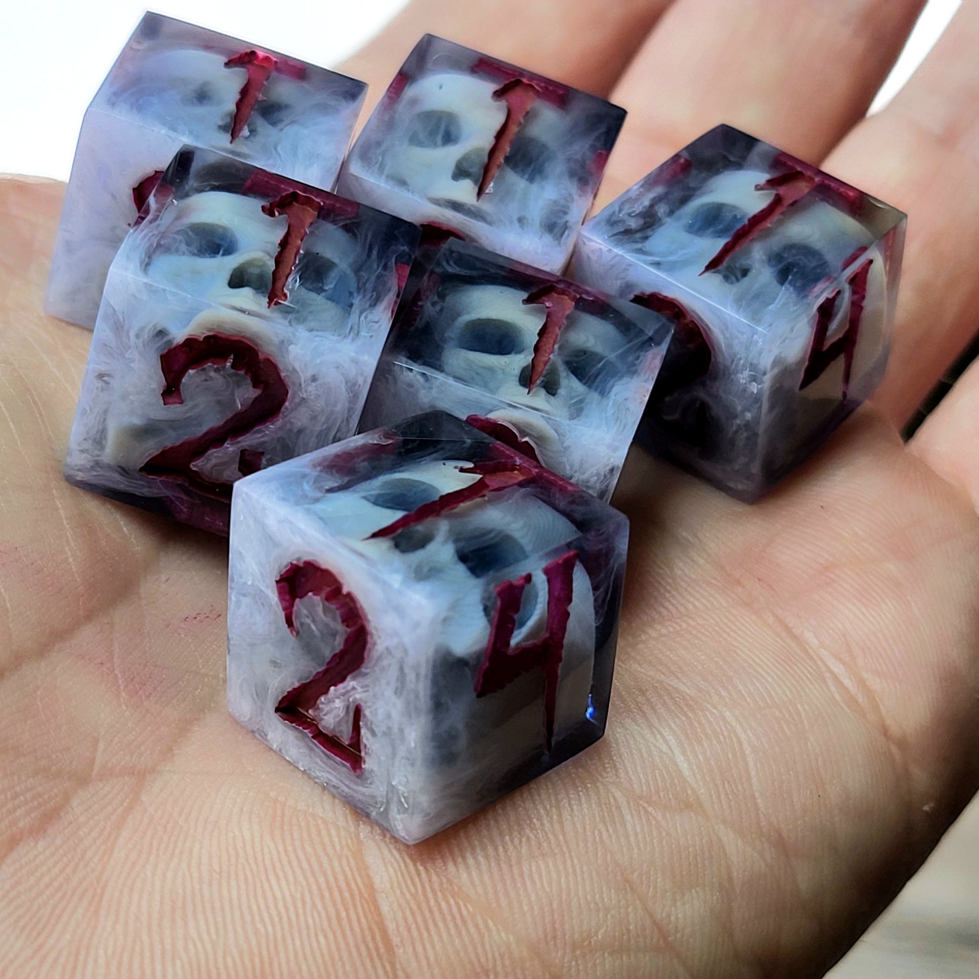 Dice set in D6 format with skull inside for role-playing games for Dungeons and Dragons