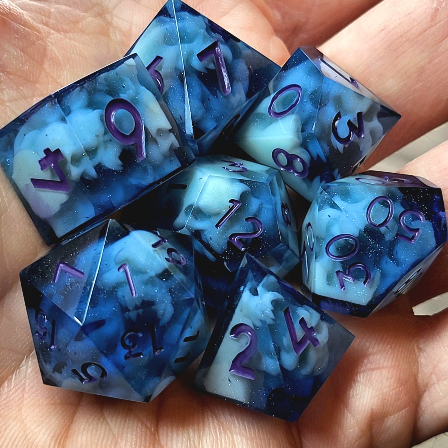 Dice set with light blue spirit inside and purple numbers for play dnd , dungeons and dragons