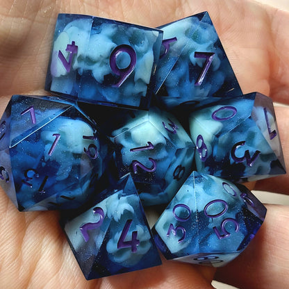 Dice set with light blue spirit inside and purple numbers for play dnd , dungeons and dragons