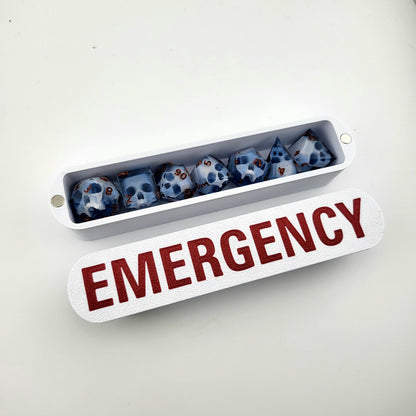 dice box white and red with the word emergency printed on it for dnd and dungeons and dragons games