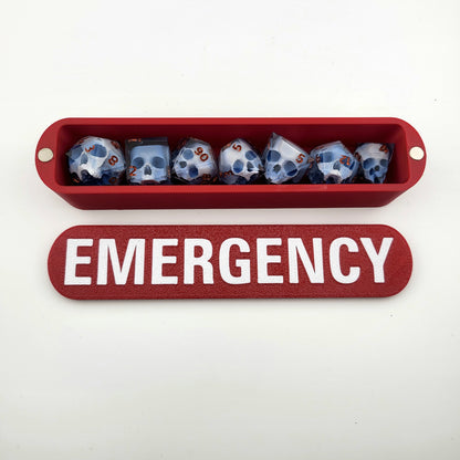 dice box white and red with the word emergency printed on it for dnd and dungeons and dragons games