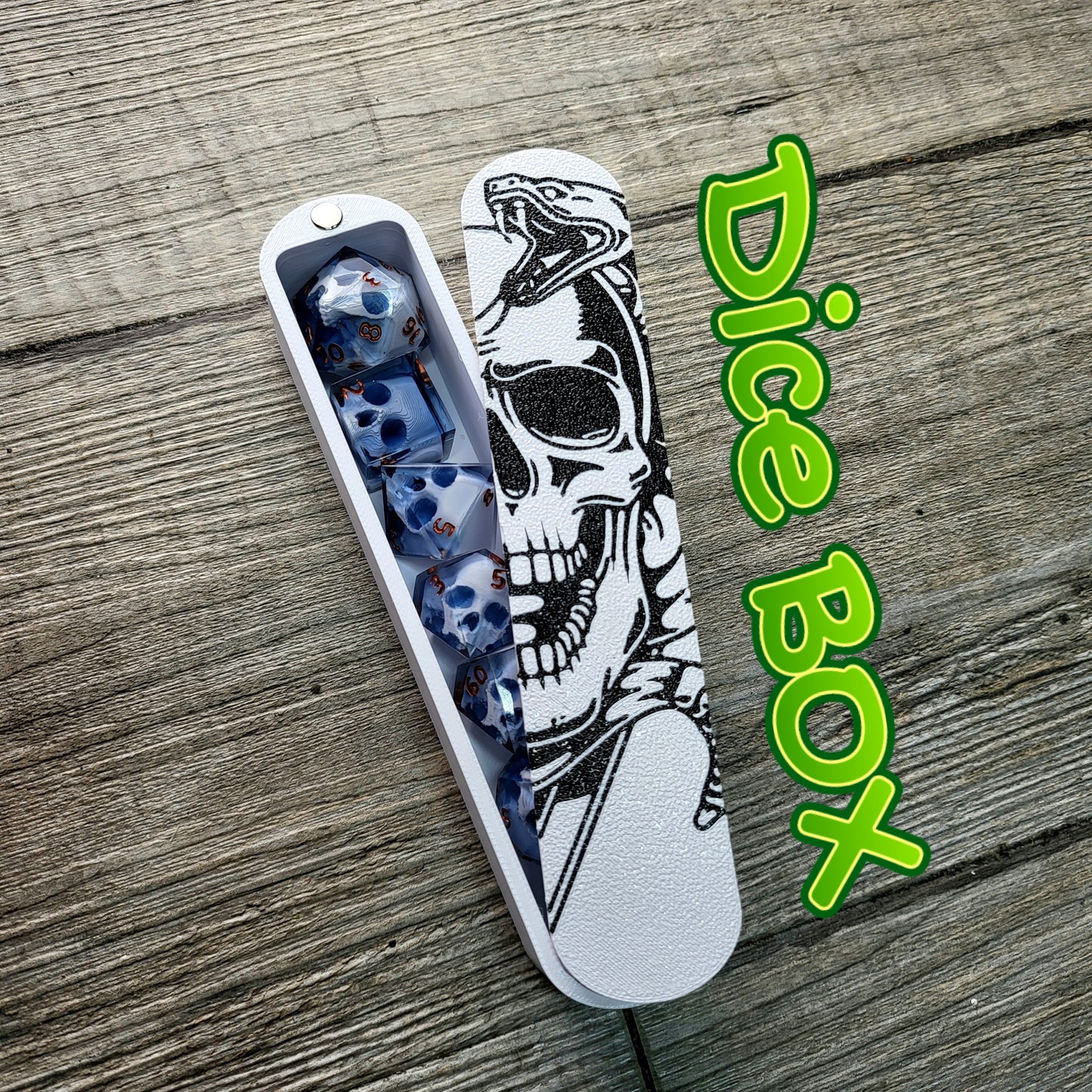 dice box white and black with the skull and snake printed on it for dnd and dungeons and dragons games