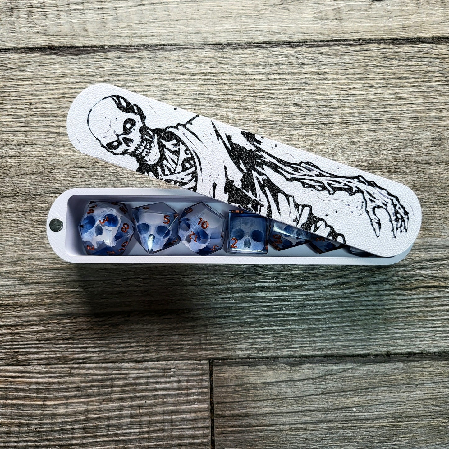 dice box white and black with the undead zombie printed on it for dnd and dungeons and dragons games