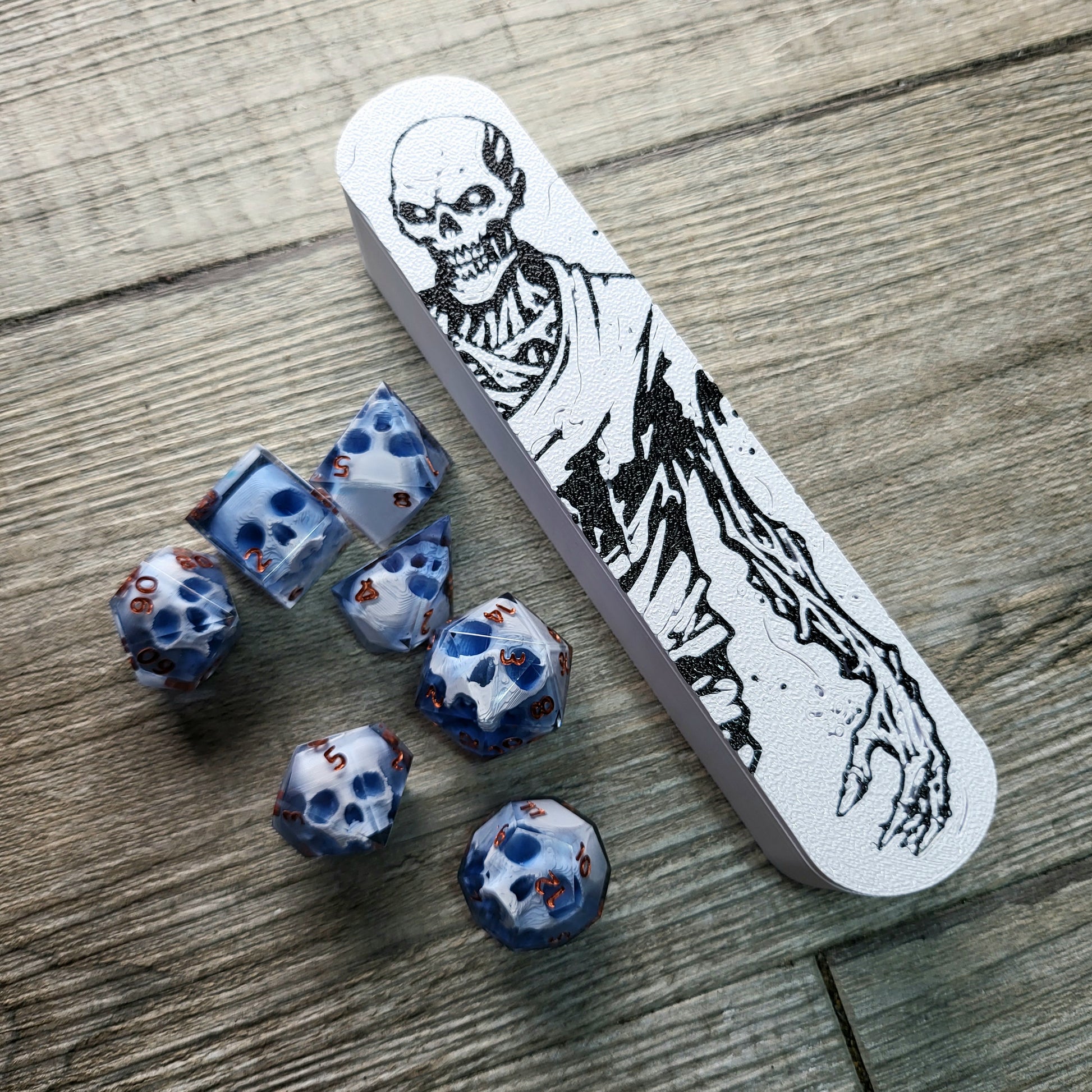 dice box white and black with the undead zombie printed on it for dnd and dungeons and dragons games