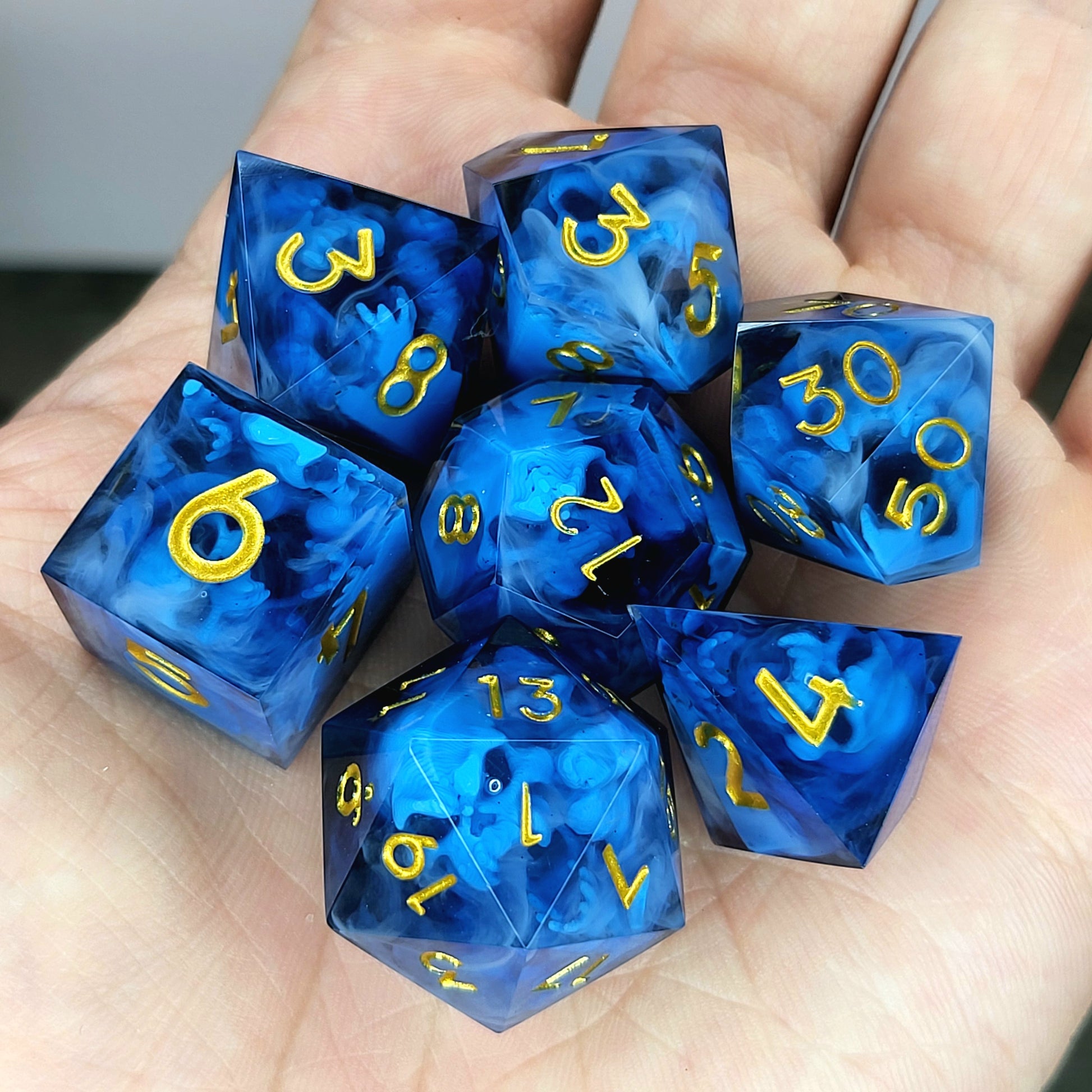 Dice set with blue spirit inside and black resin for play dnd , dungeons and dragons