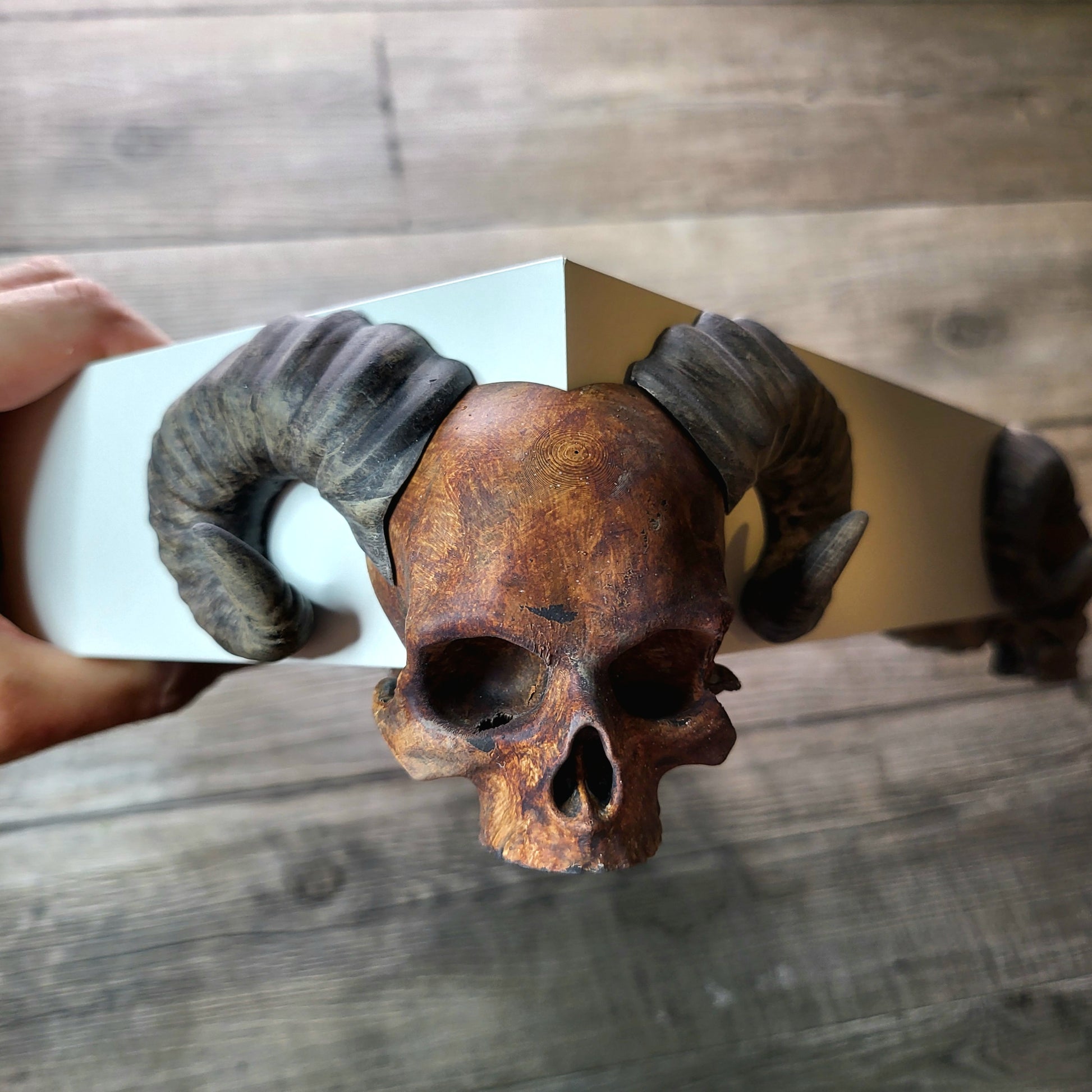 Dice tray with skull feet for dice rolling for tabletop role playing board games